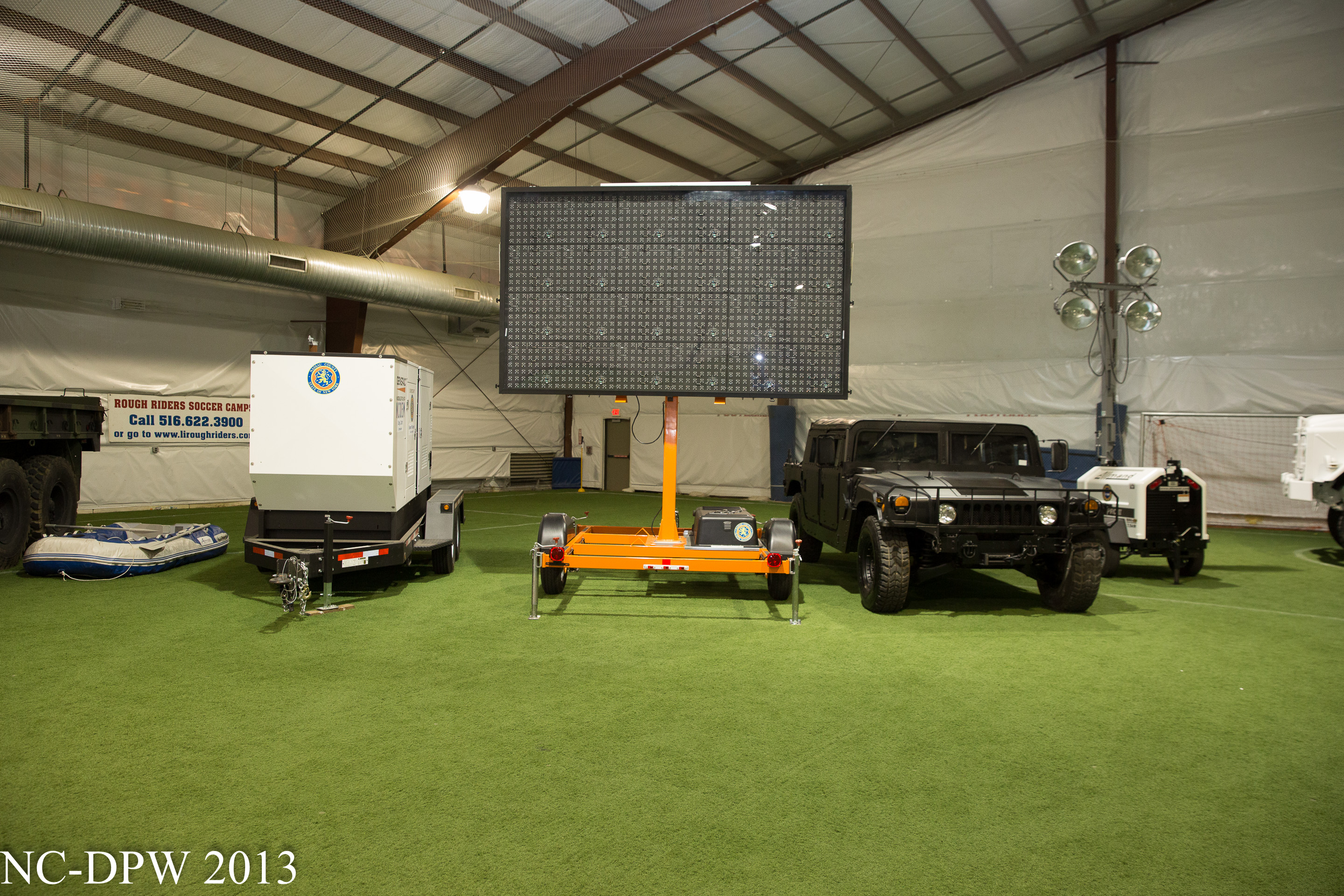 Blank signs and vehicles in a shed
