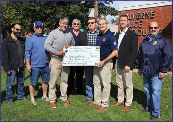 LEGISLATOR GAYLOR DELIVERS CHECK TO VILLAGE OF MALVERNE FOR POLICE RADAR