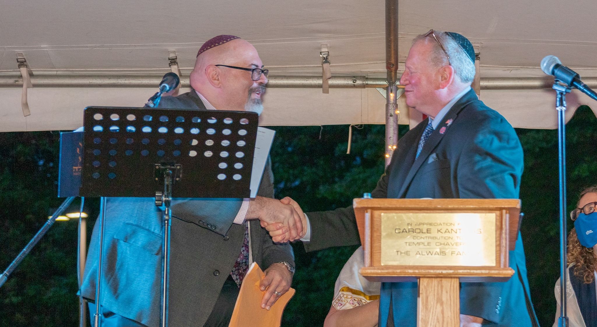 Legislator Drucker thanks Cantor Hyman for his service on May 22