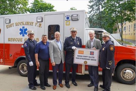 LEGISLATOR GAYLOR PRESENTS COVID-19 SERVICE BARS TO EAST ROCKAWAY FIRE DEPT.