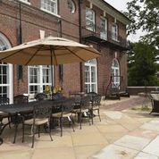 Back patio of brick home