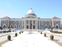 Large capital building covered in snow