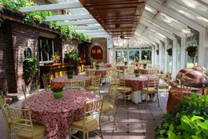 Sunroom with tables and chairs